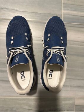 On Running Blue and White Cloud Athletic Sneakers
